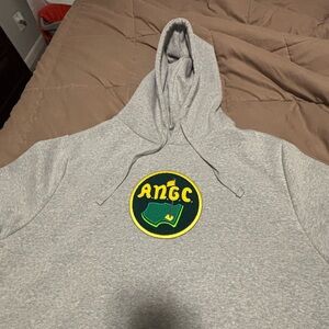 American Needle Gray Hoodie with Green and Yellow Patch